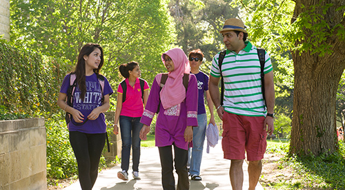 Students walking outside on campus
